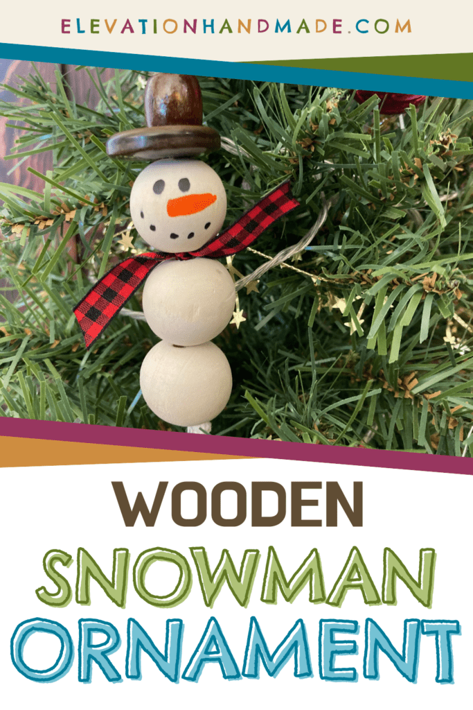 Pinterest image finished snowman ornament handing in a Christmas tree