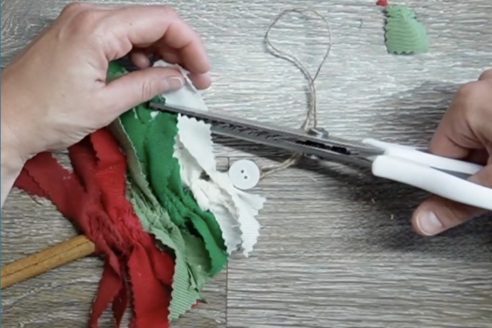 trim the fabric strips to make a tree shape